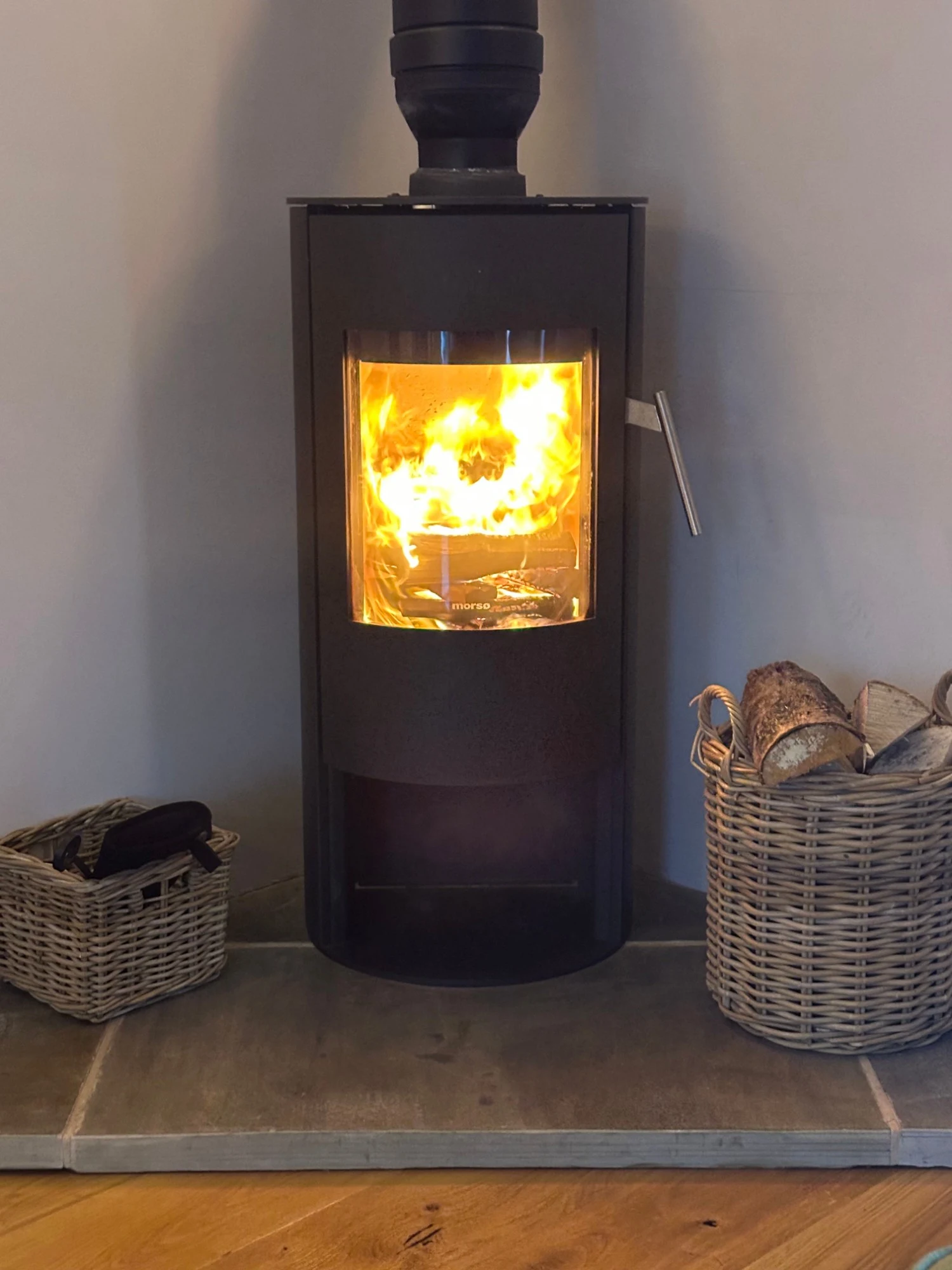 The wood burner, lit, at Mixon View
