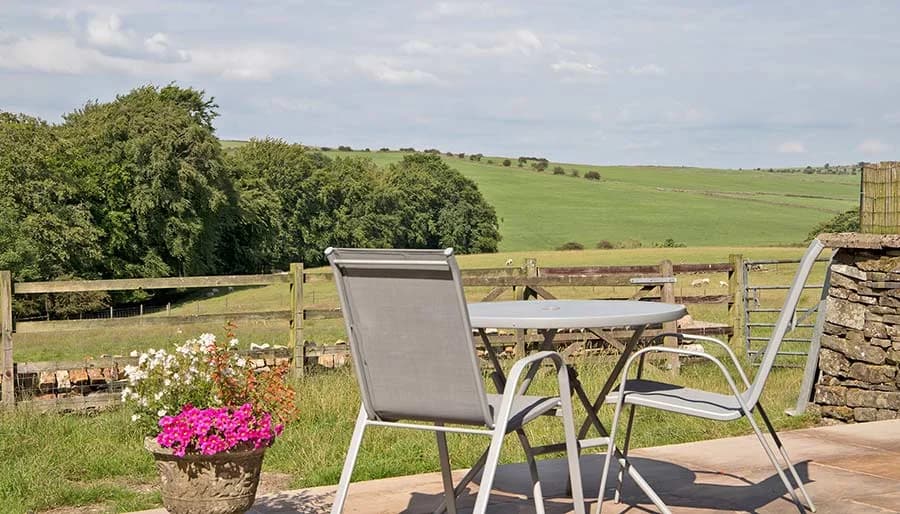 The terrace at Mixon View, with open farmland running out to the ridge